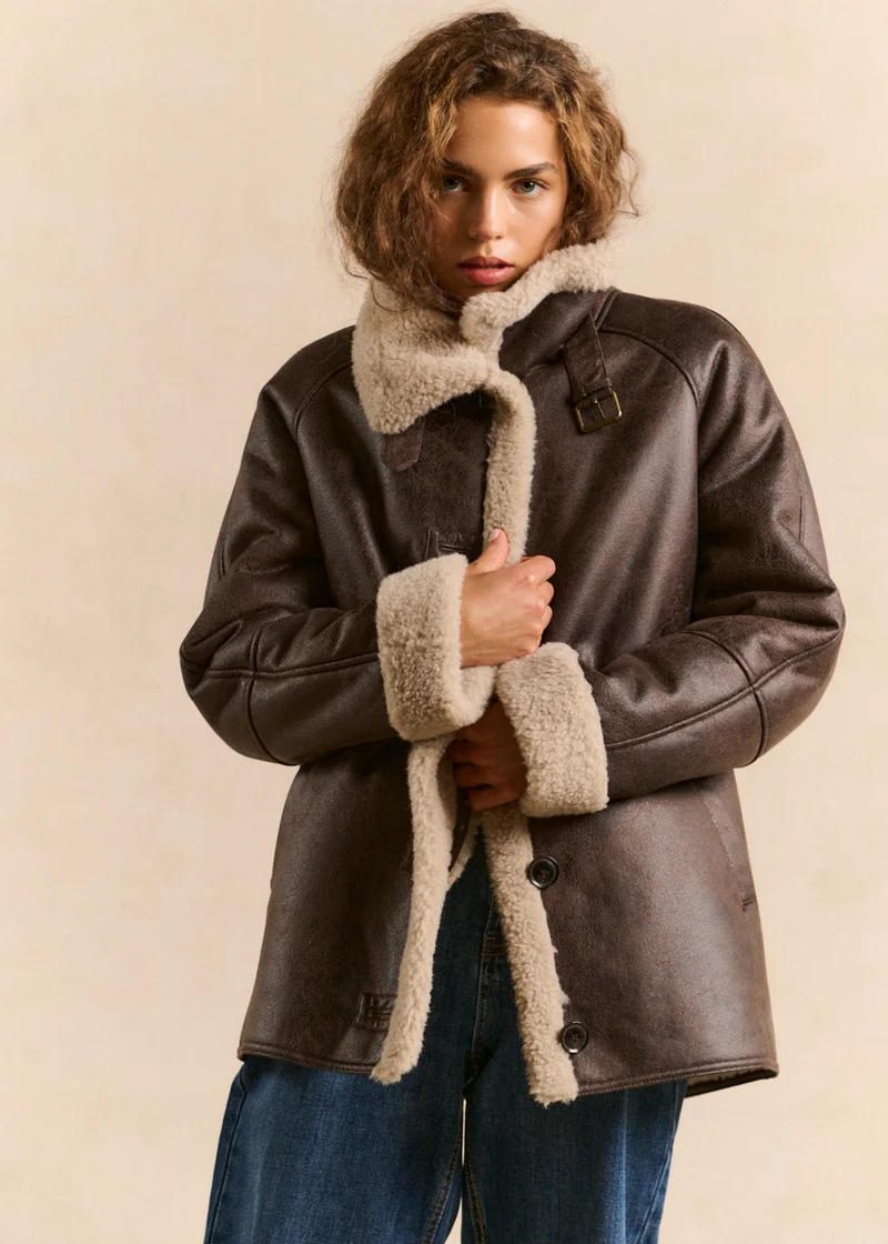 Manteau col haut effet suede