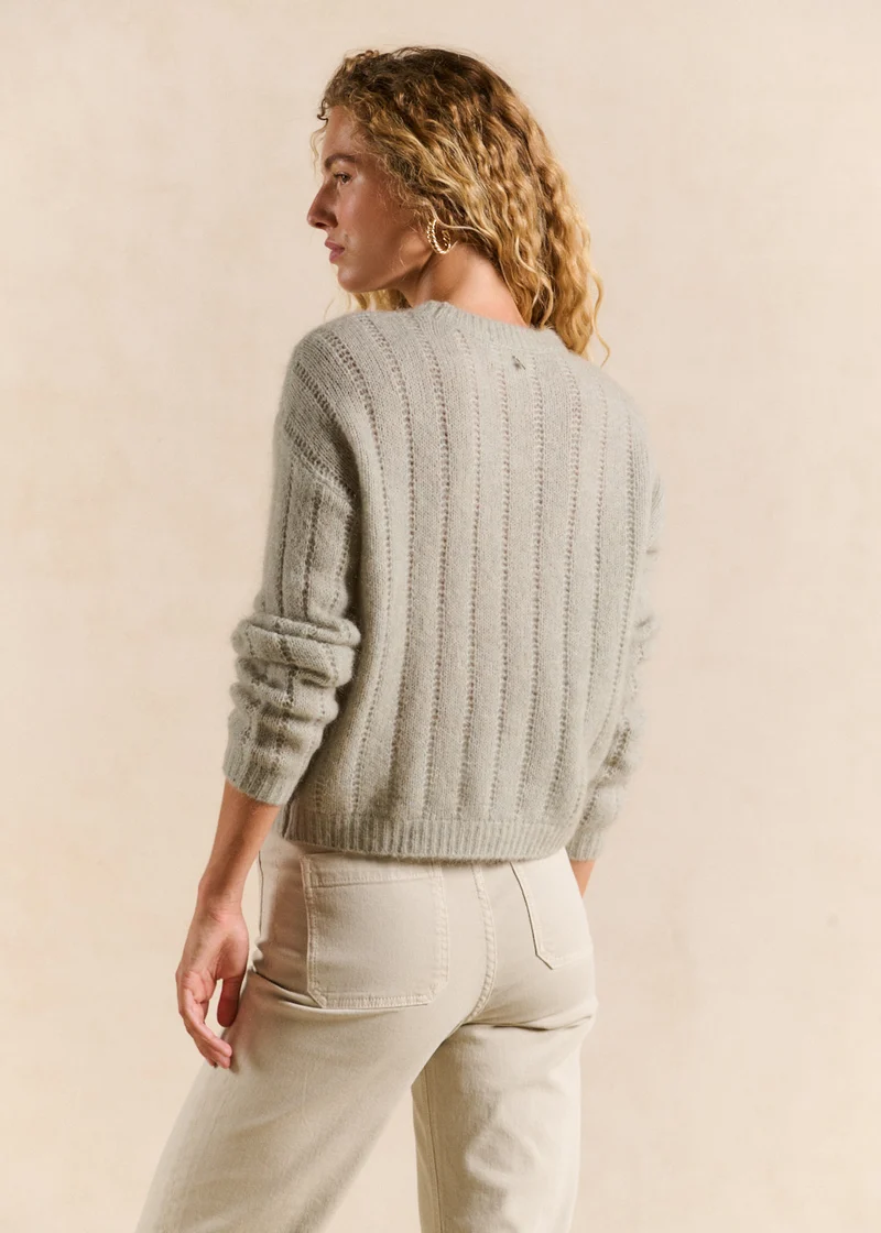 Pull col rond en maille ajourée