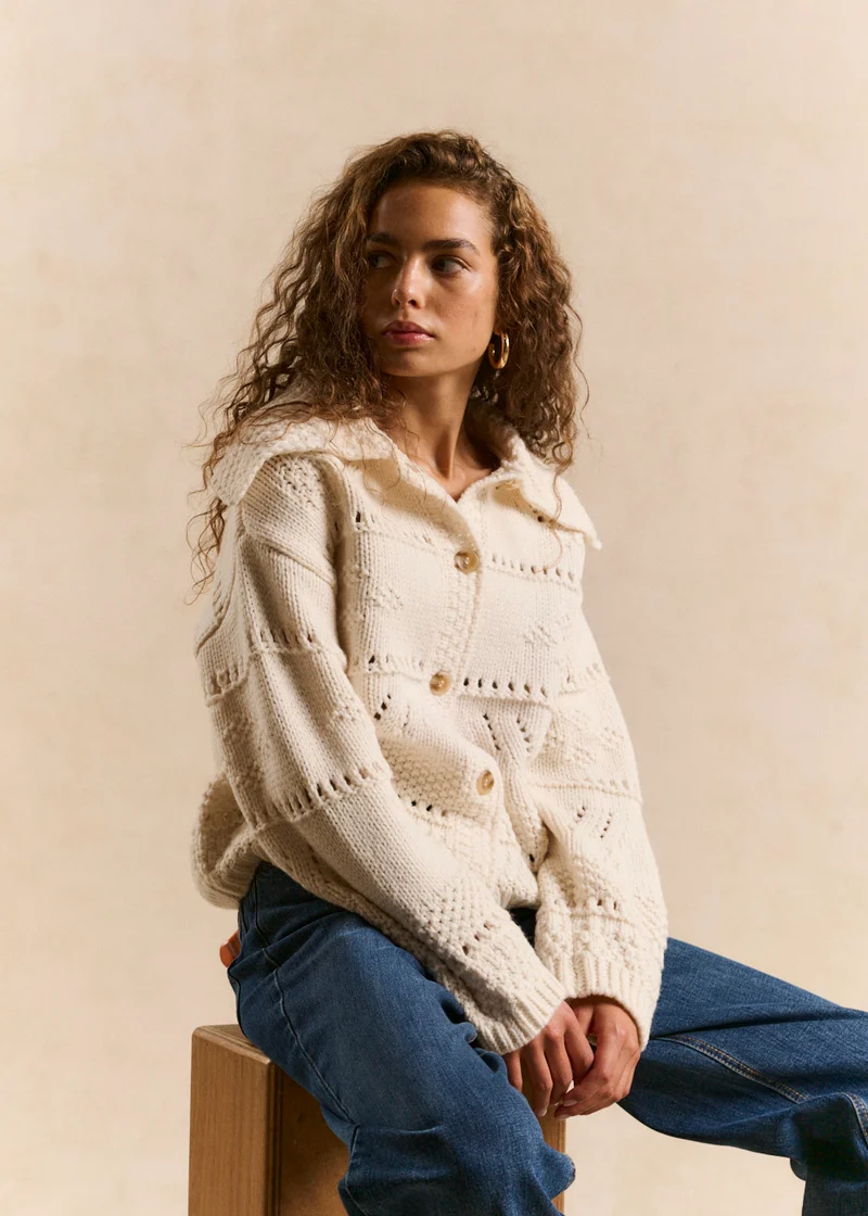 Gilet jacquard fleuri à grand col