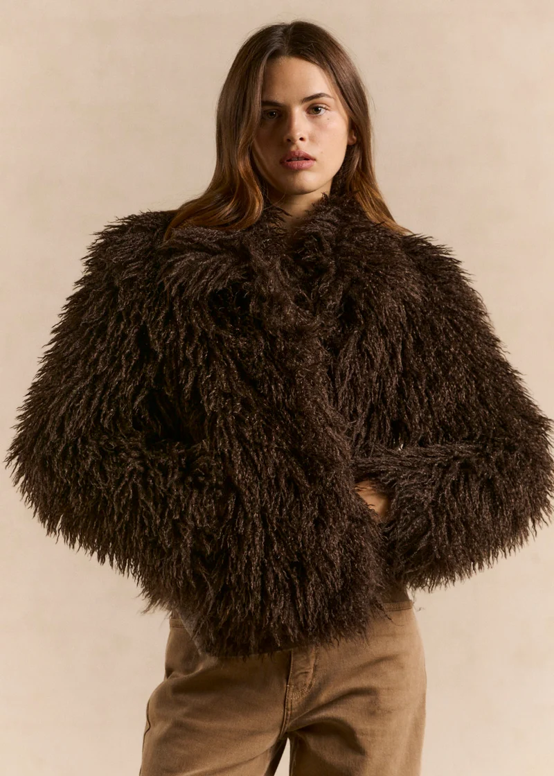 Veste courte en fausse fourrure