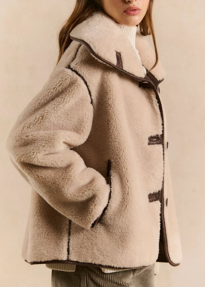 Manteau réversible effet fourrure