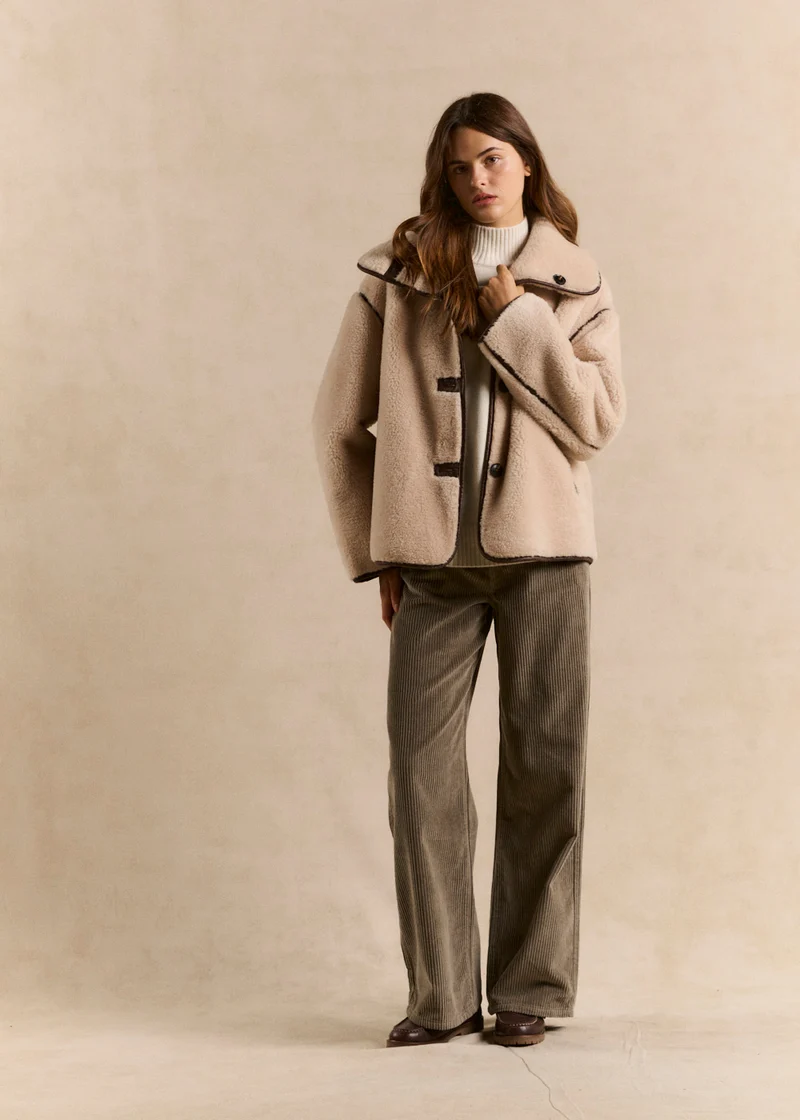 Manteau réversible effet fourrure
