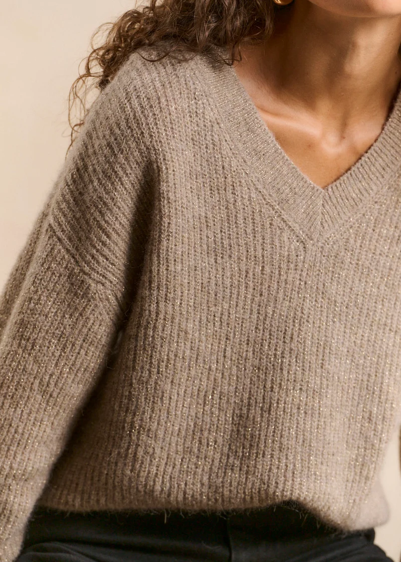 Pull scintillant col en V