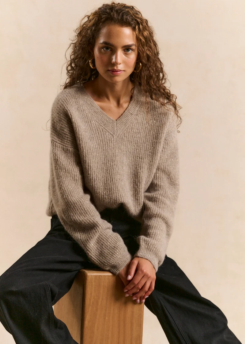 Pull scintillant col en V