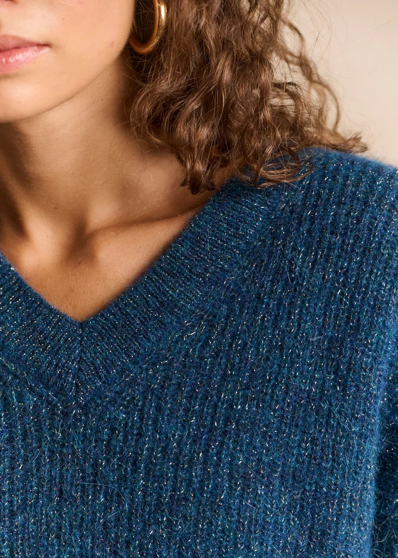 Pull scintillant col en V