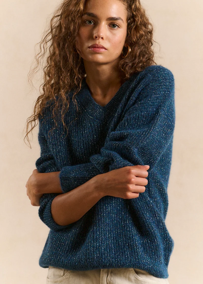 Pull scintillant col en V