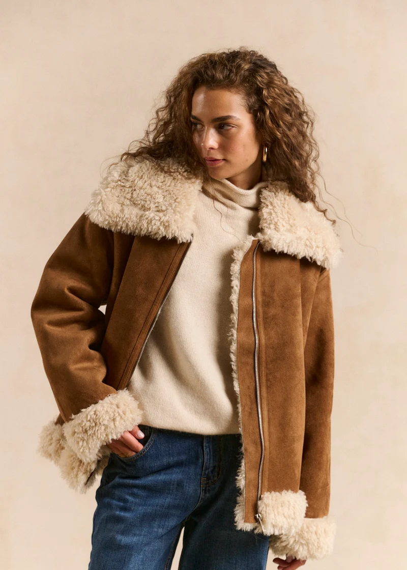 Veste courte en fausse peau lainée