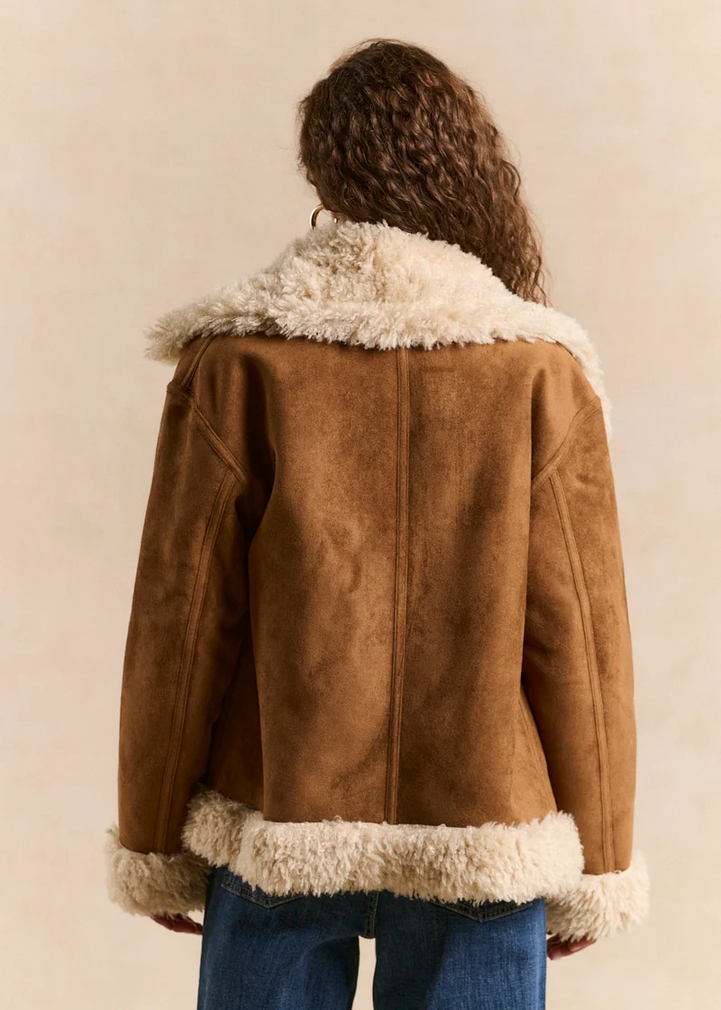 Veste courte en fausse peau lainée