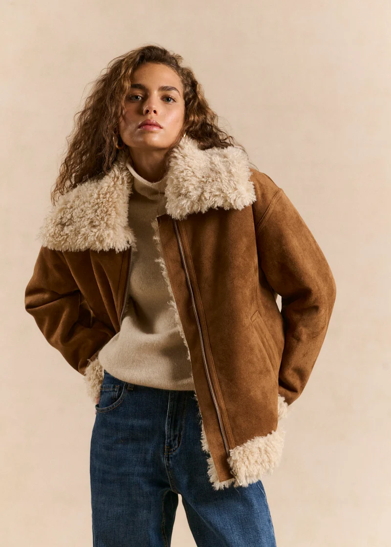 Veste courte en fausse peau lainée