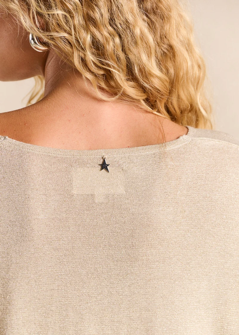 Pull col V oversize en maille brillante et manches courtes