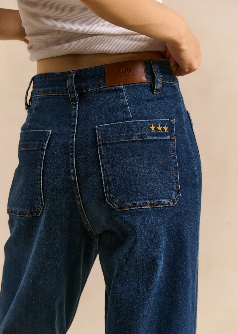Jean à jambes larges avec revers et taille haute