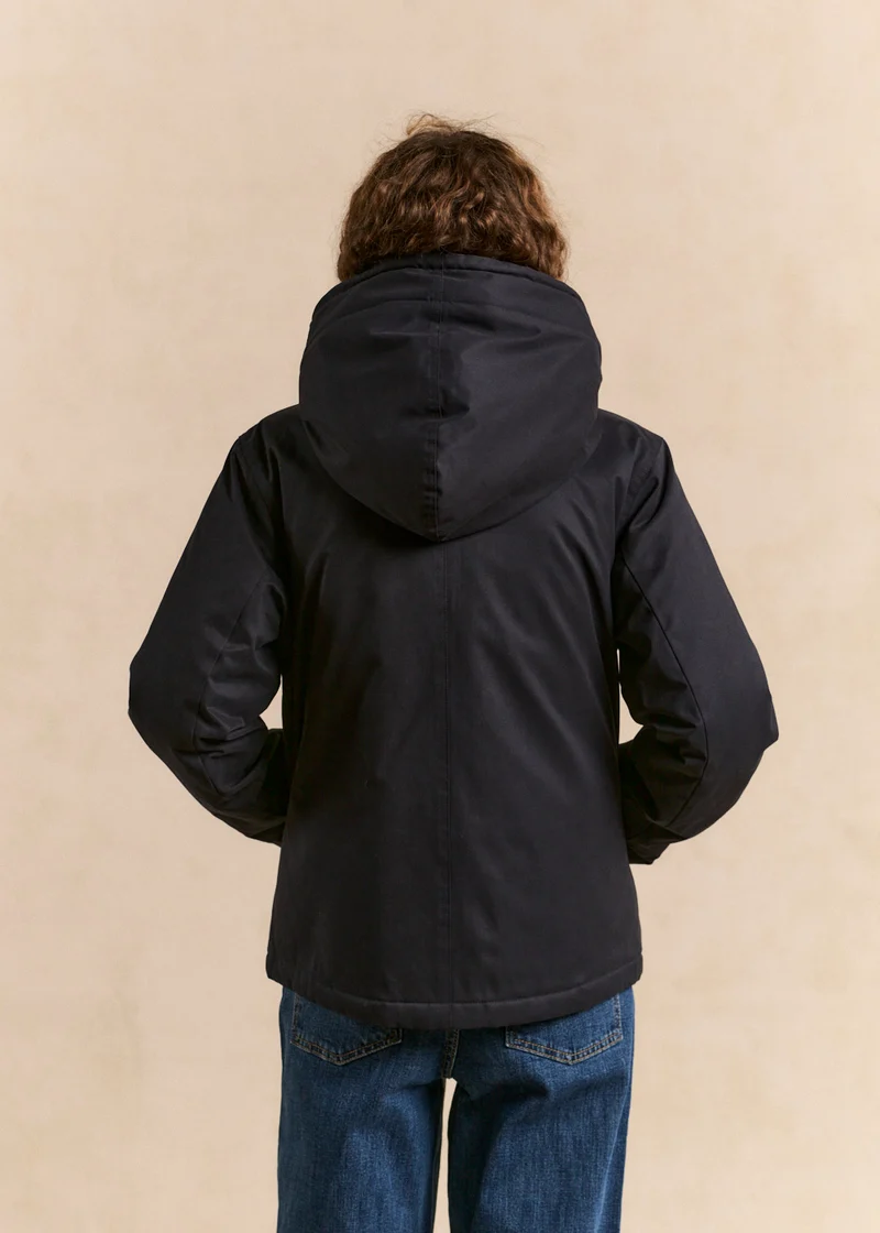 Veste courte déperlante doublée fausse fourrure avec capuche